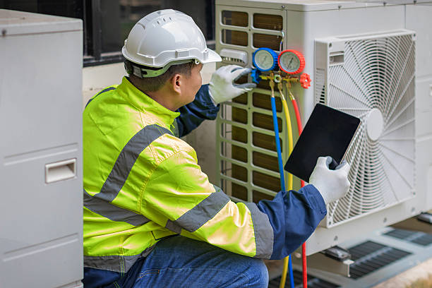Professional Heat Pump Repair technician working in Clarksville, TX